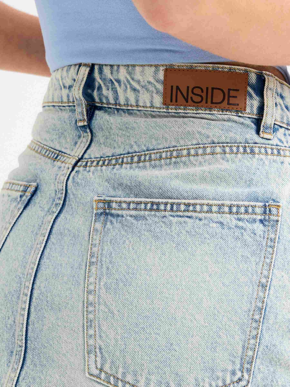 Ripped denim mini skirt blue detail view