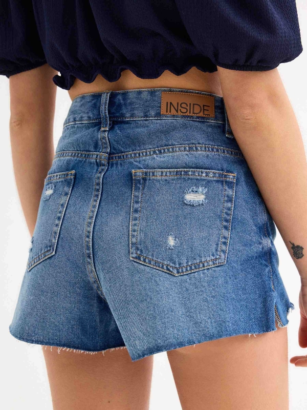 Ripped denim shorts blue back detail view