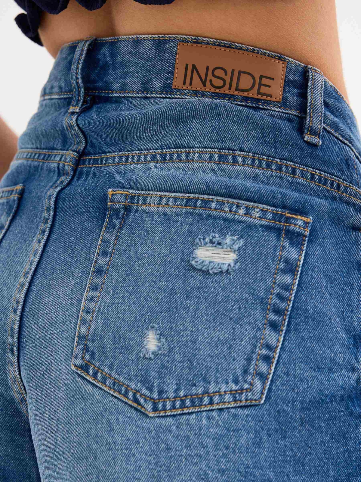 Ripped denim shorts blue detail view