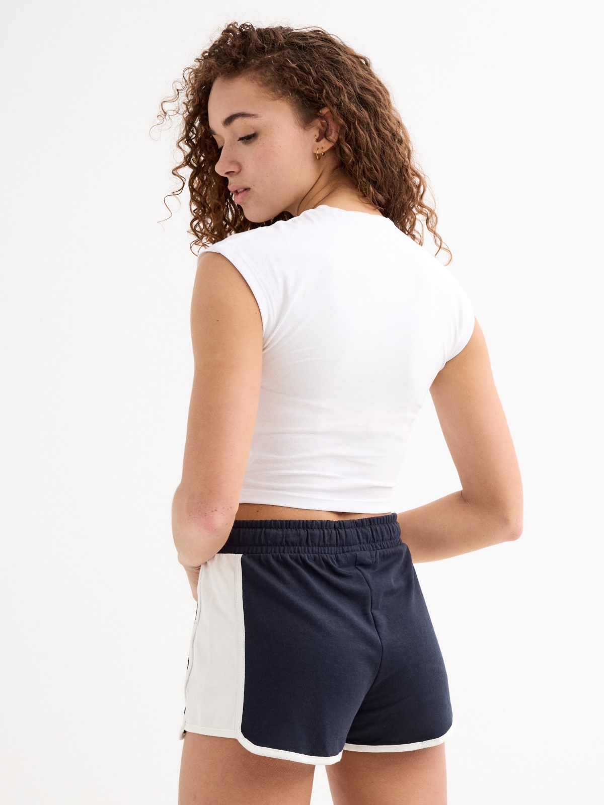 Two-tone sports shorts navy middle back view