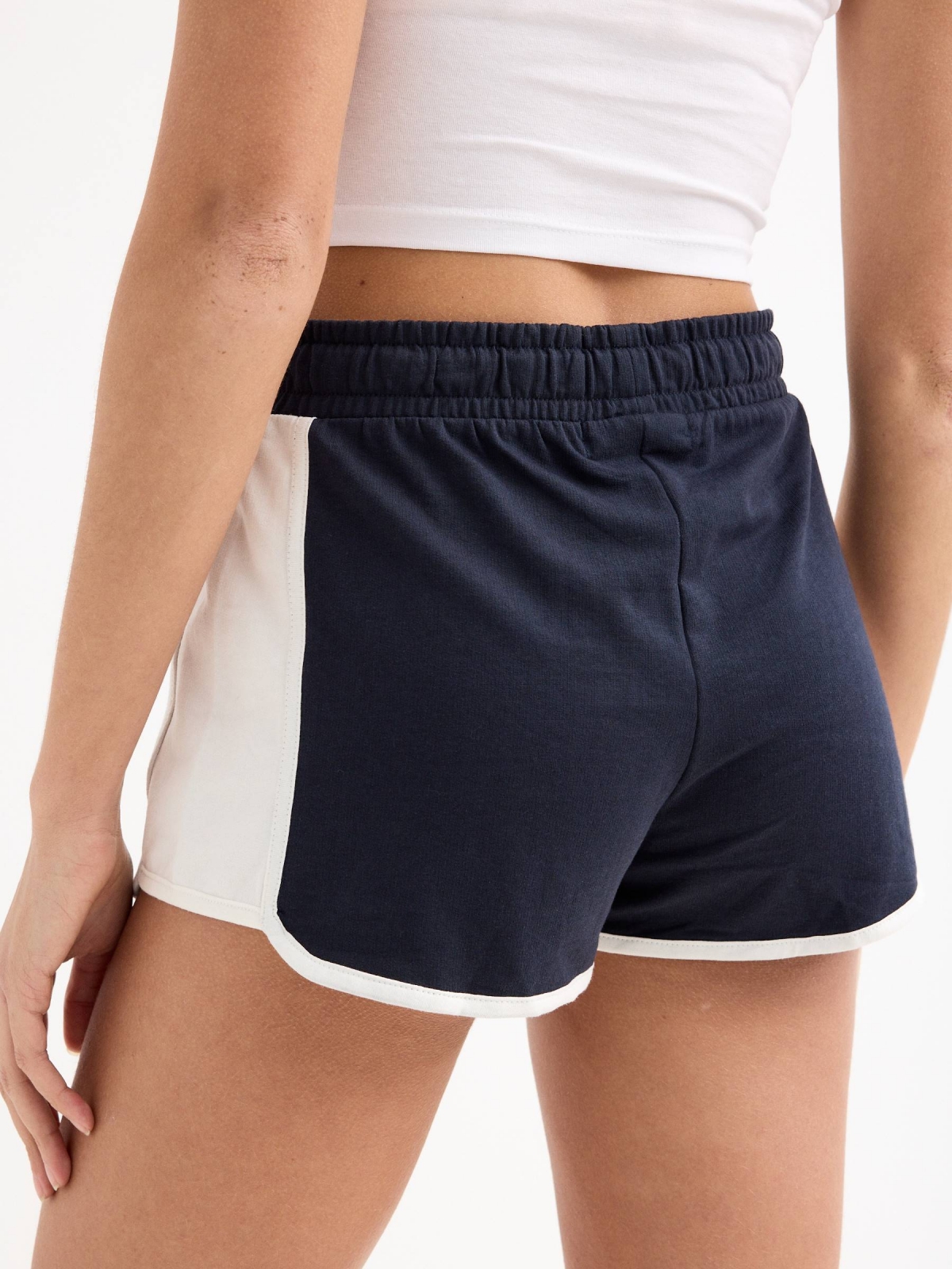 Two-tone sports shorts navy back detail view