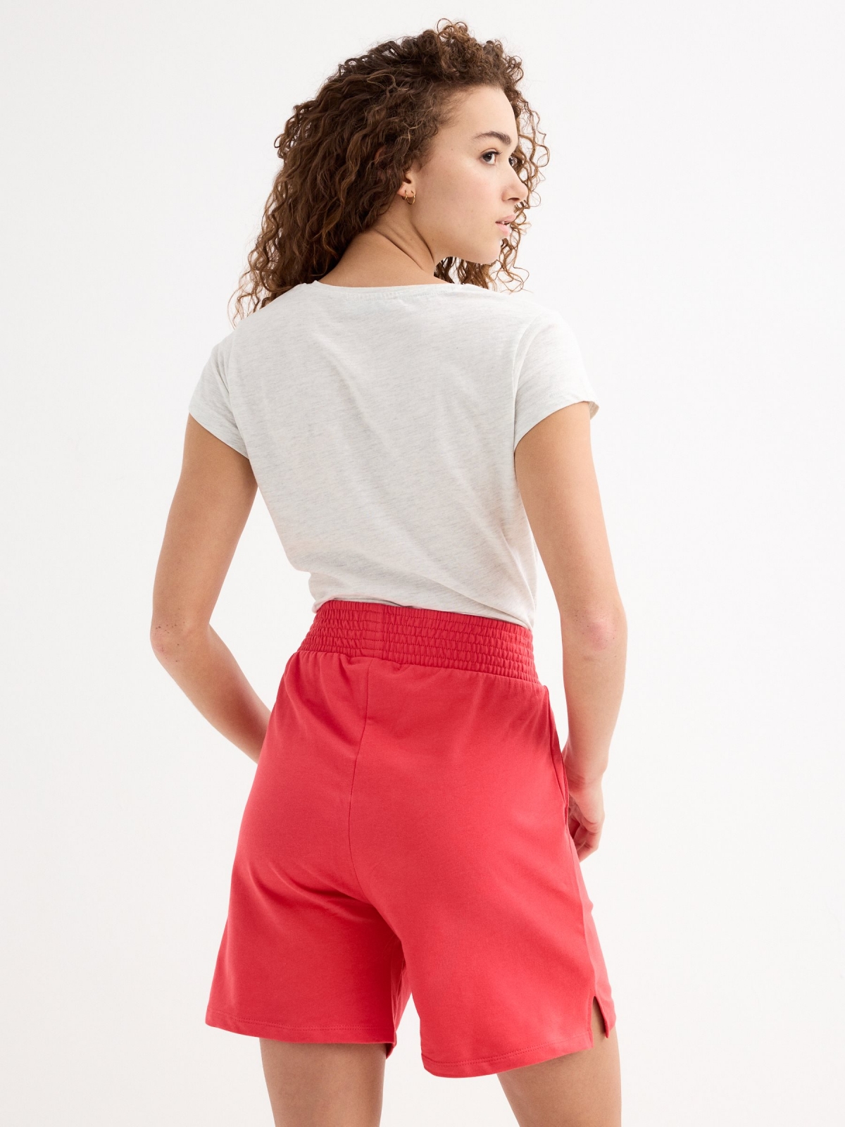 Knitted shorts with slits red middle back view