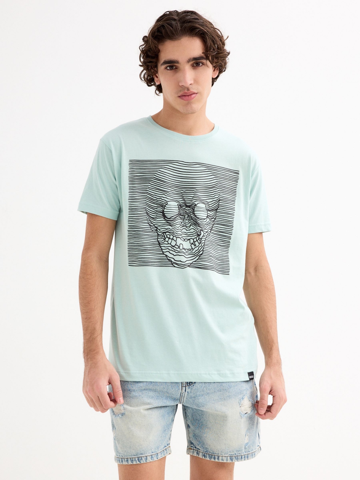 T-shirt com linhas de caveira verde vista meia frontal