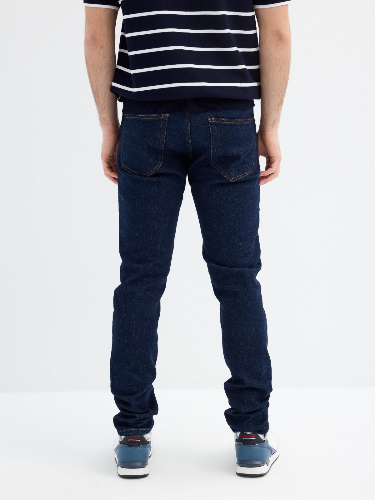 Dark blue slim jeans blue middle back view