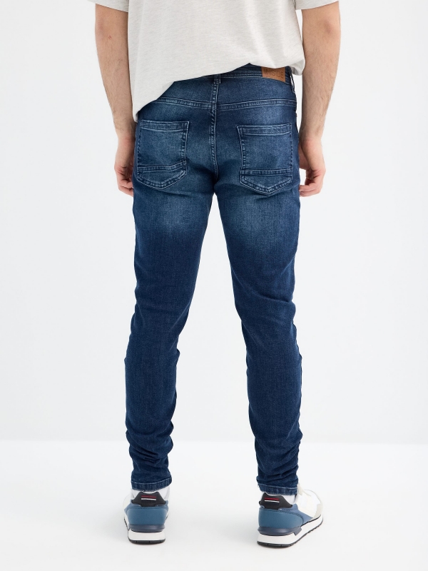 Basic carrot jeans blue middle back view