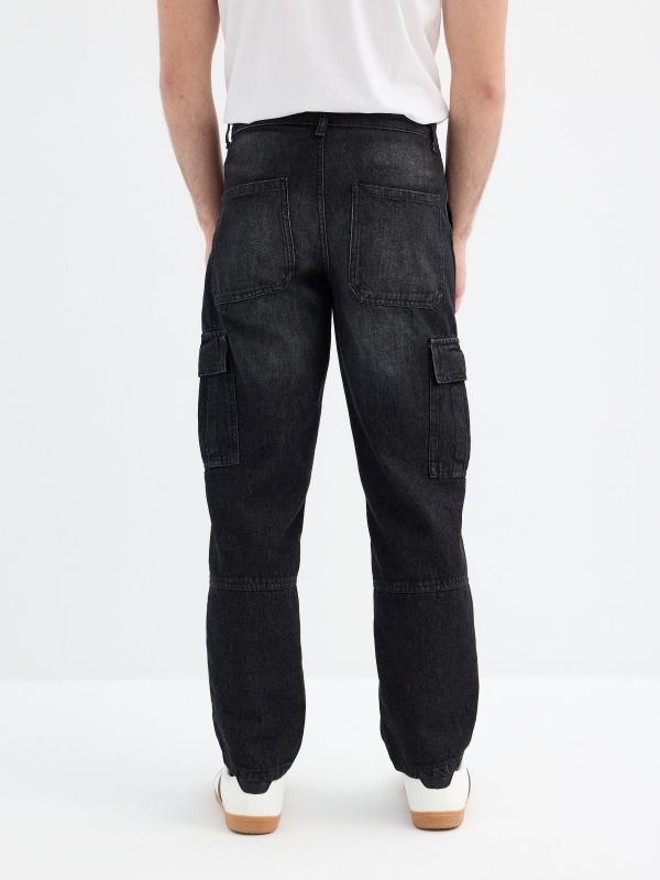 Blue multi-pocket cargo jeans black middle back view