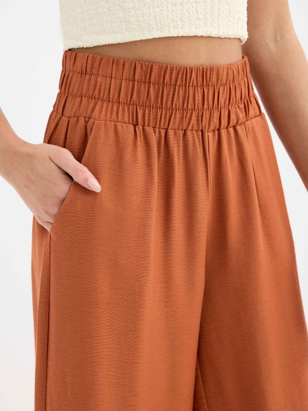 Flowy wide-leg pants dark brown detail view