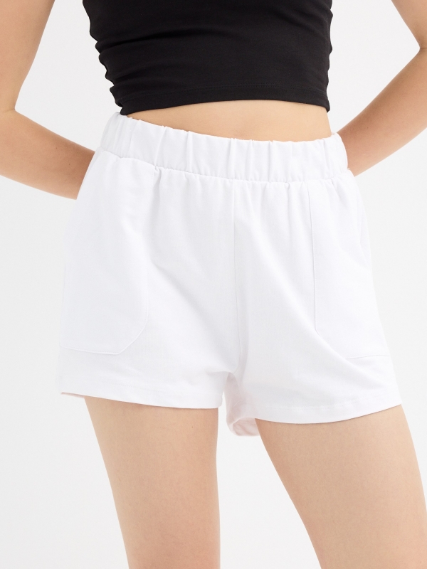 Elastic waist shorts with pockets white front detail view