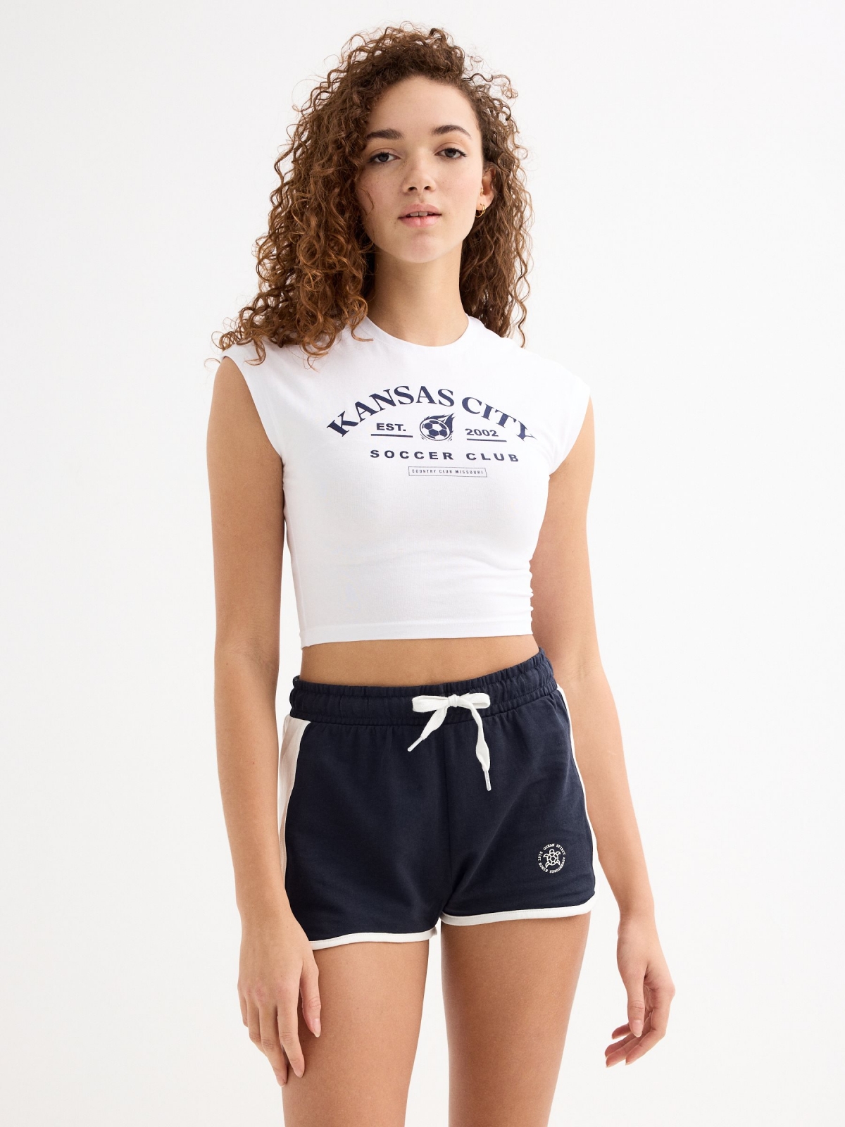 Camiseta crop sin mangas Kansas blanco vista media frontal