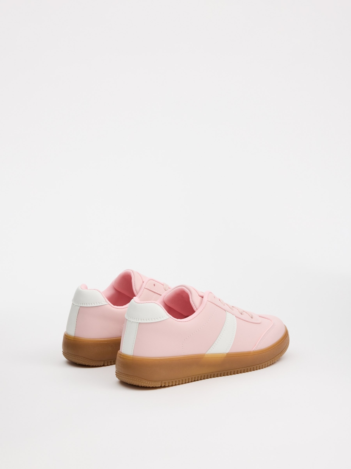 Low platform skater sneakers pink 45º back view