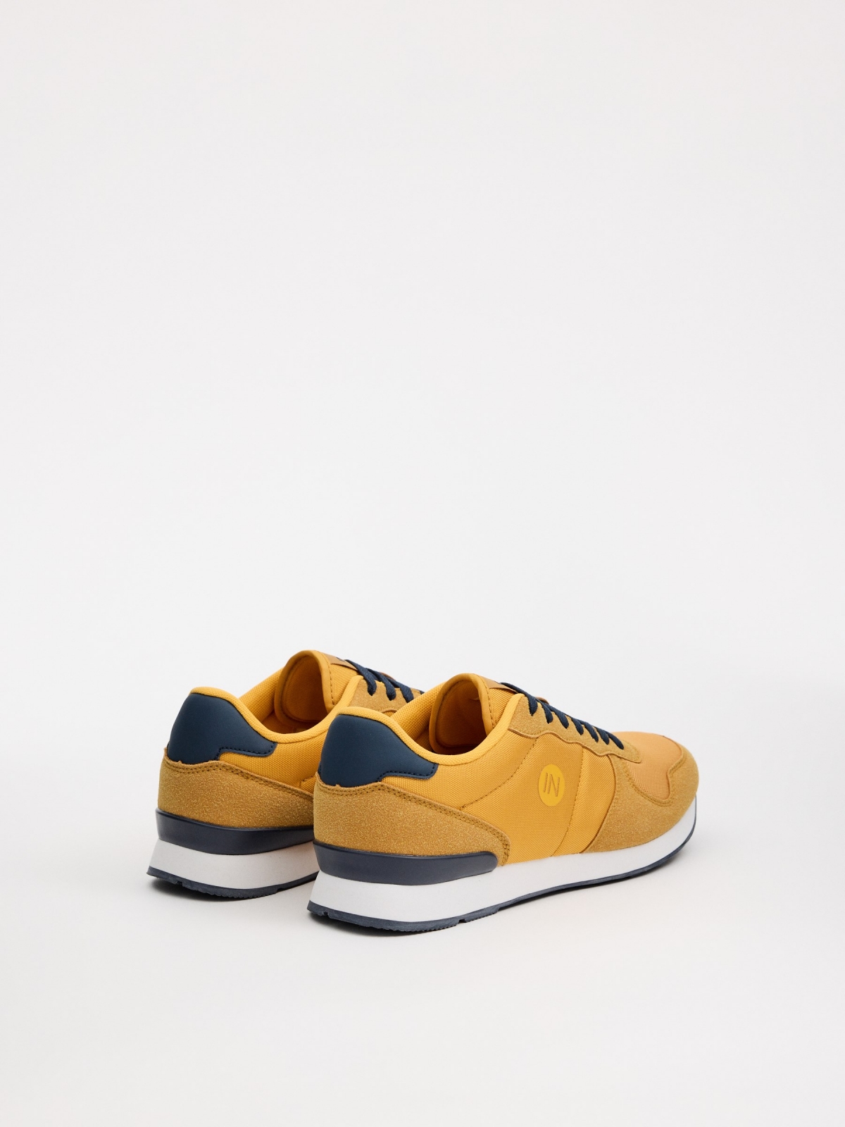 Casual low mustard sneakers mustard 45º back view