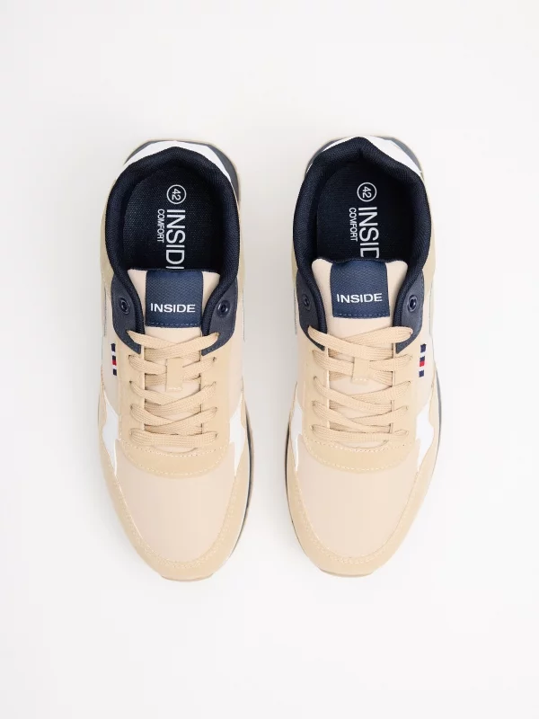 Casual low sneakers sand sand zenithal view