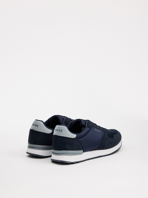 Blue casual low-top sneakers blue 45º back view