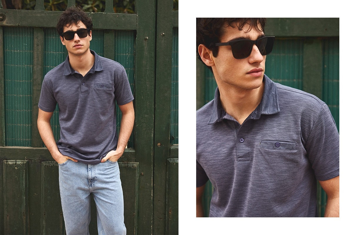 Short sleeve polo with button pocket navy middle front view