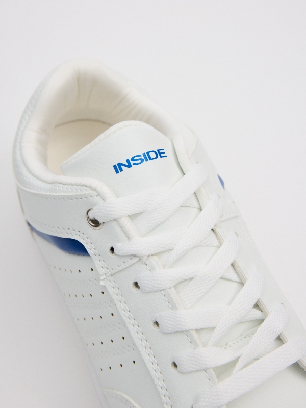 White and blue skater sneakers white detail view