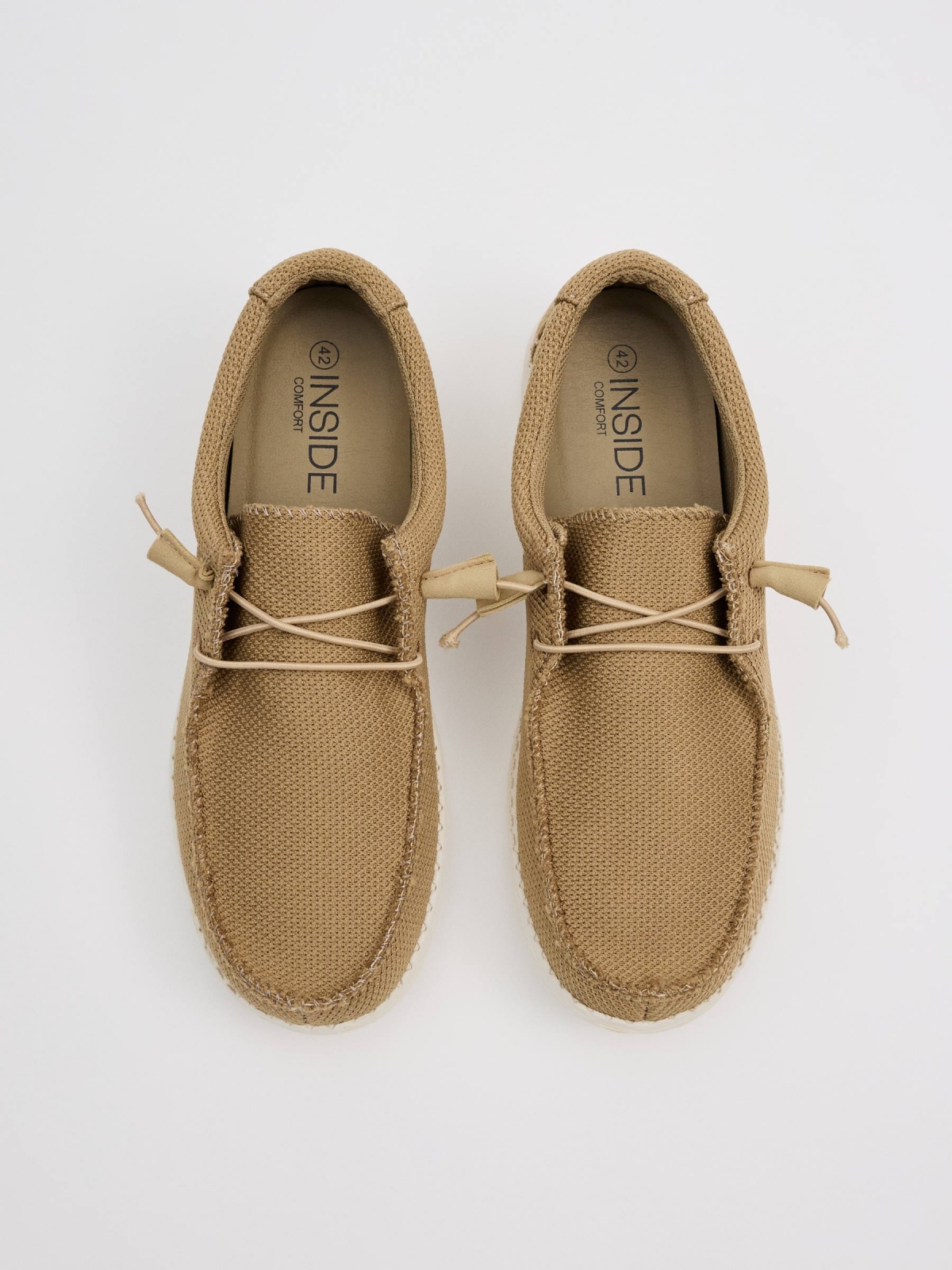 Light brown canvas wallaby shoe sand zenithal view