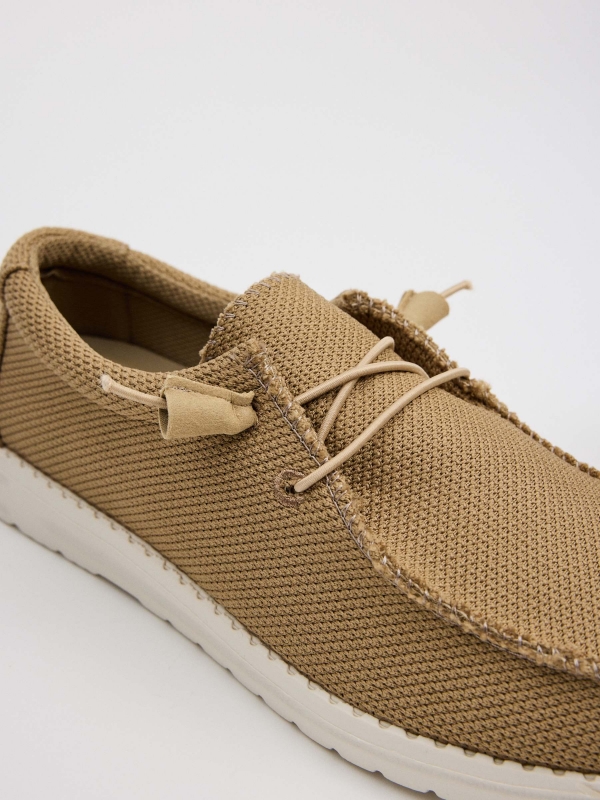 Light brown canvas wallaby shoe sand detail view