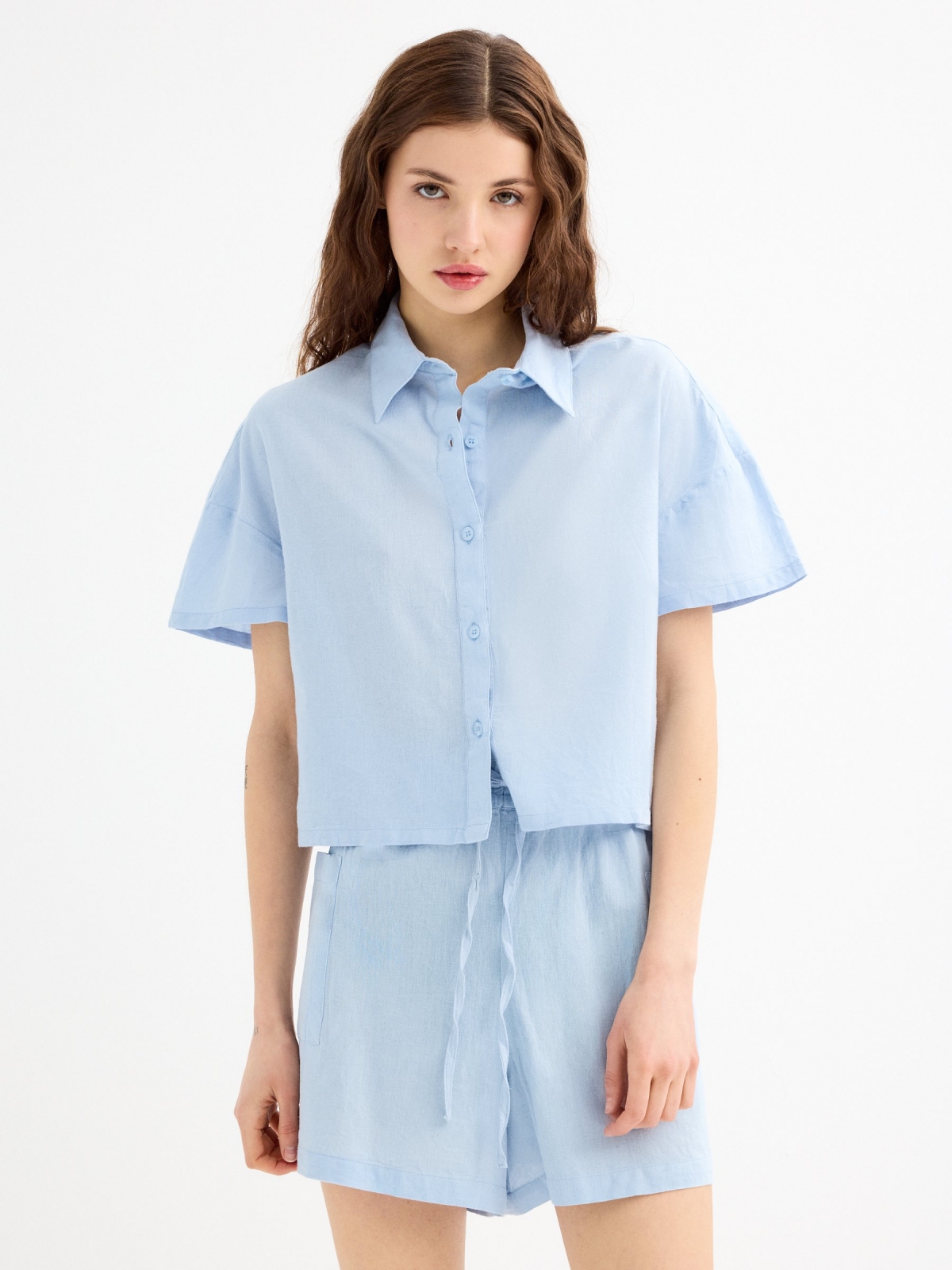 Fluid linen shorts light blue middle front view