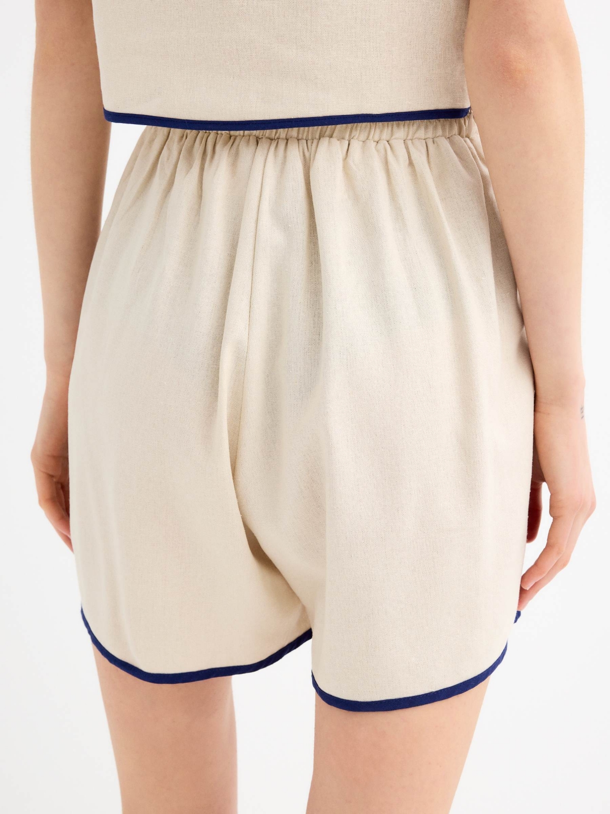 Fluid linen contrast shorts sand back detail view