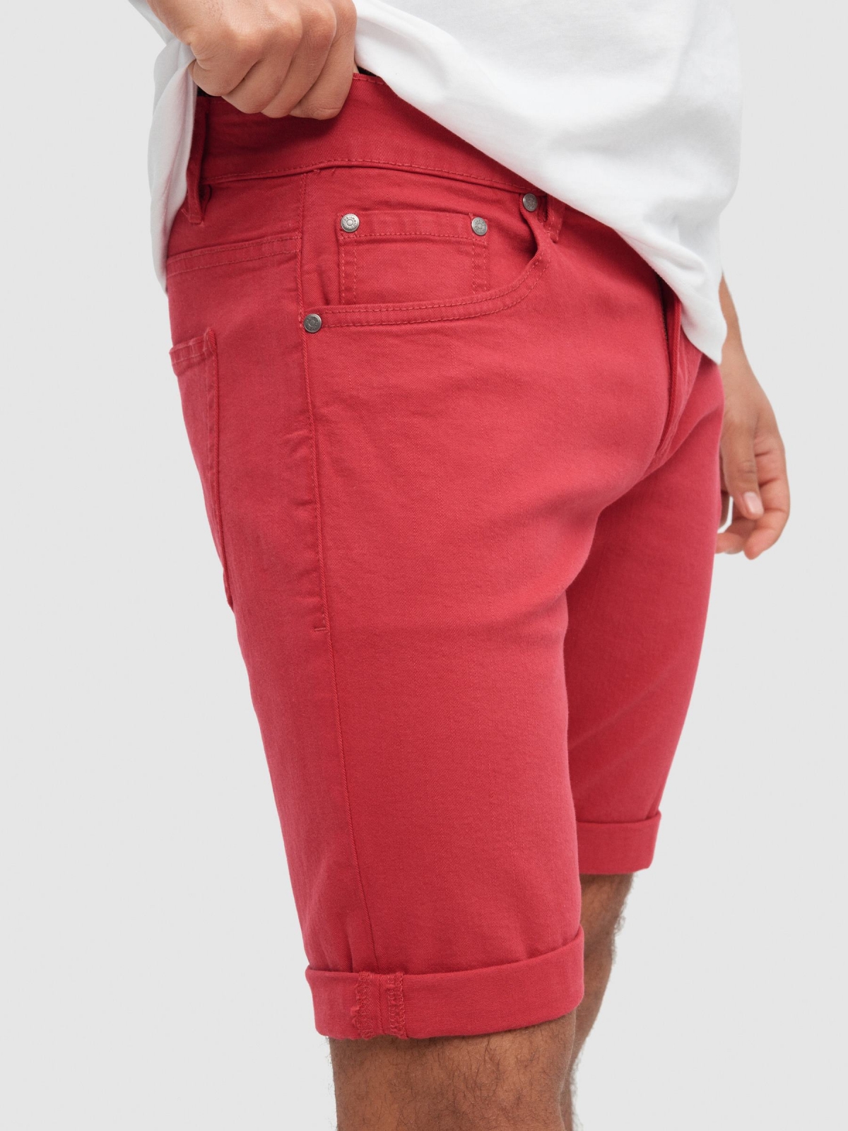 Coloured denim shorts red front detail view