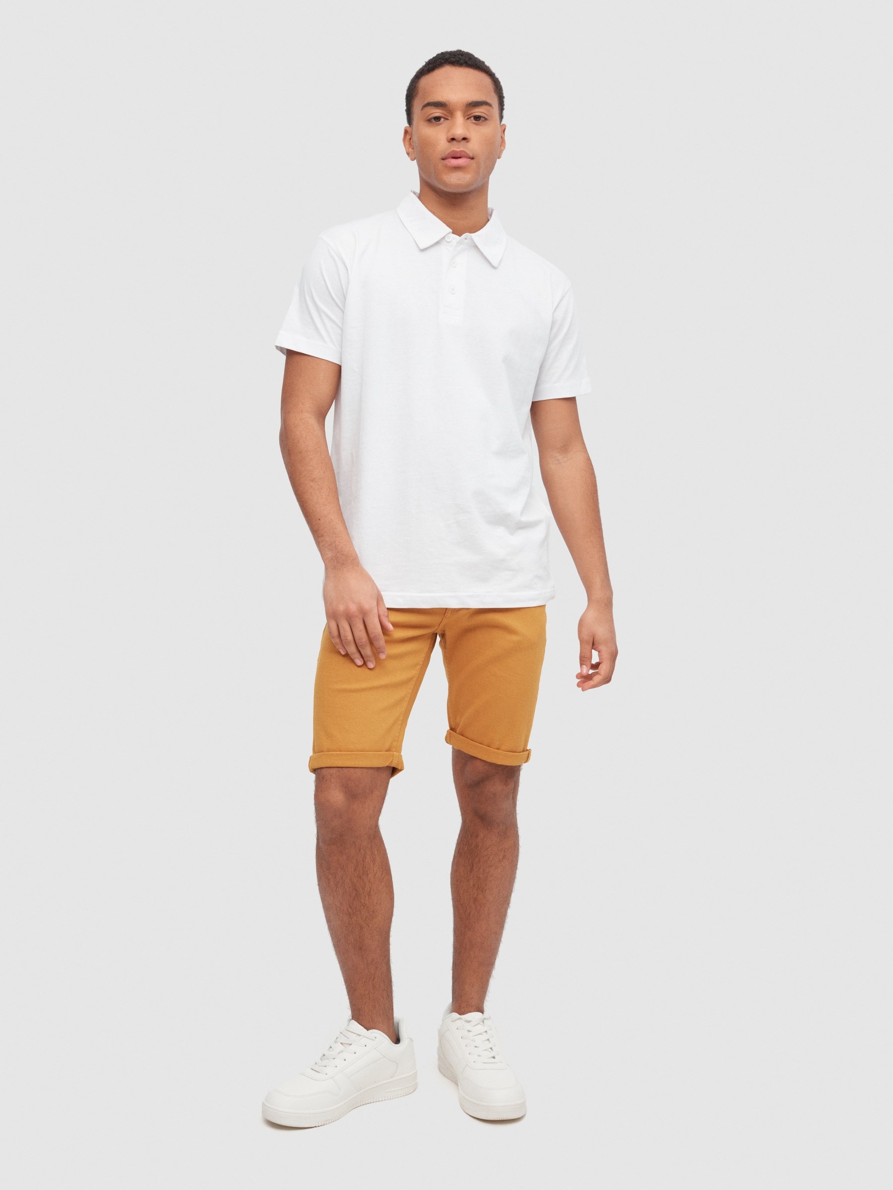 Coloured denim shorts yellow middle front view