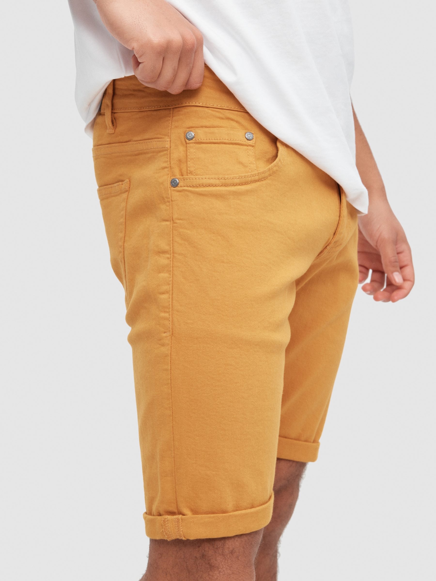 Coloured denim shorts yellow middle front view