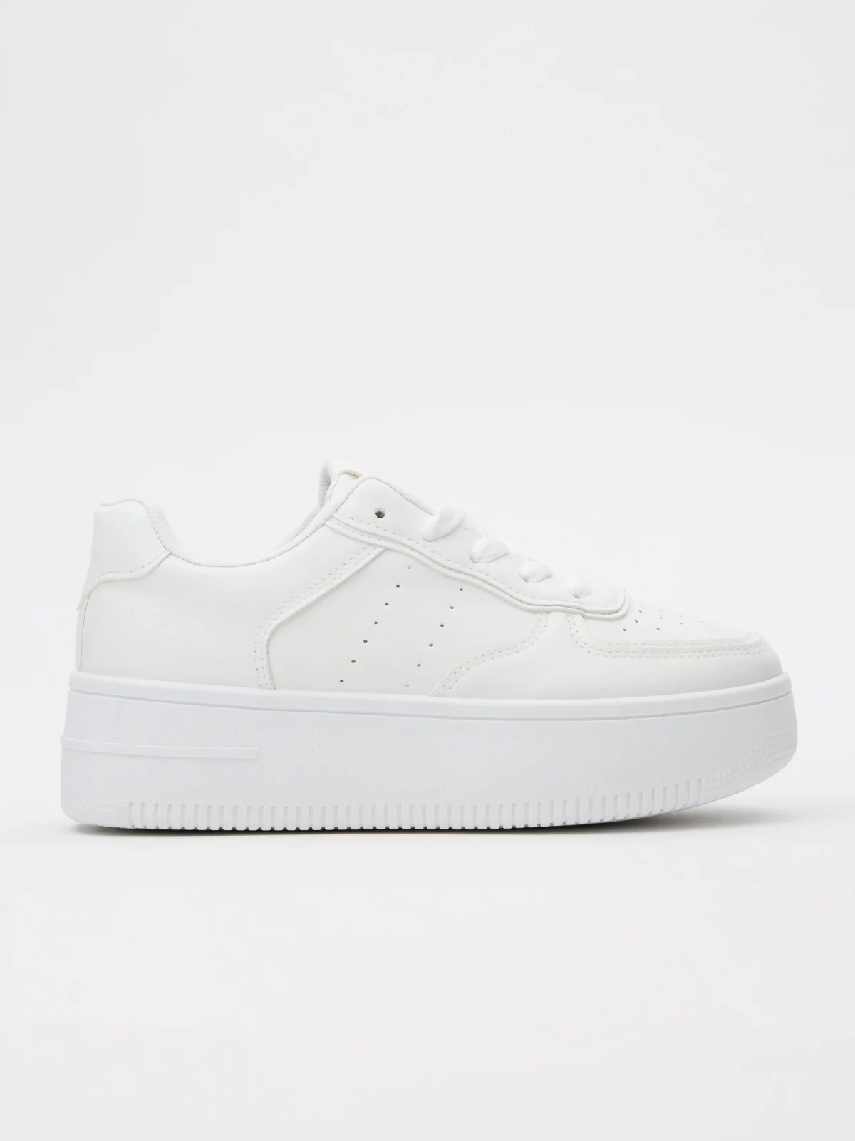 White platform low sneakers white profile view