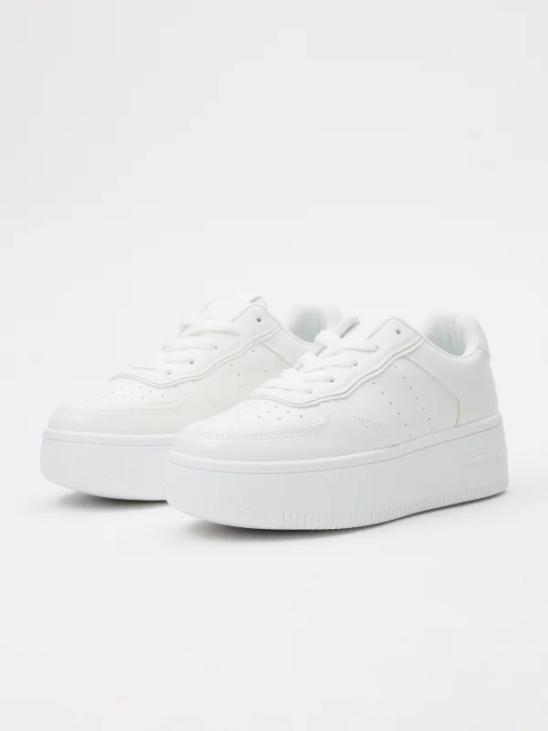 White platform low sneakers white 45º front view
