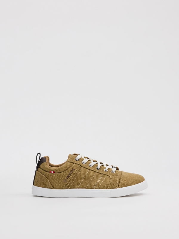 Canvas sneakers sand