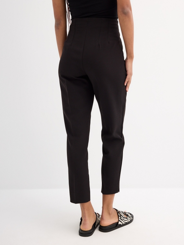 High-waisted pleated trousers black middle back view