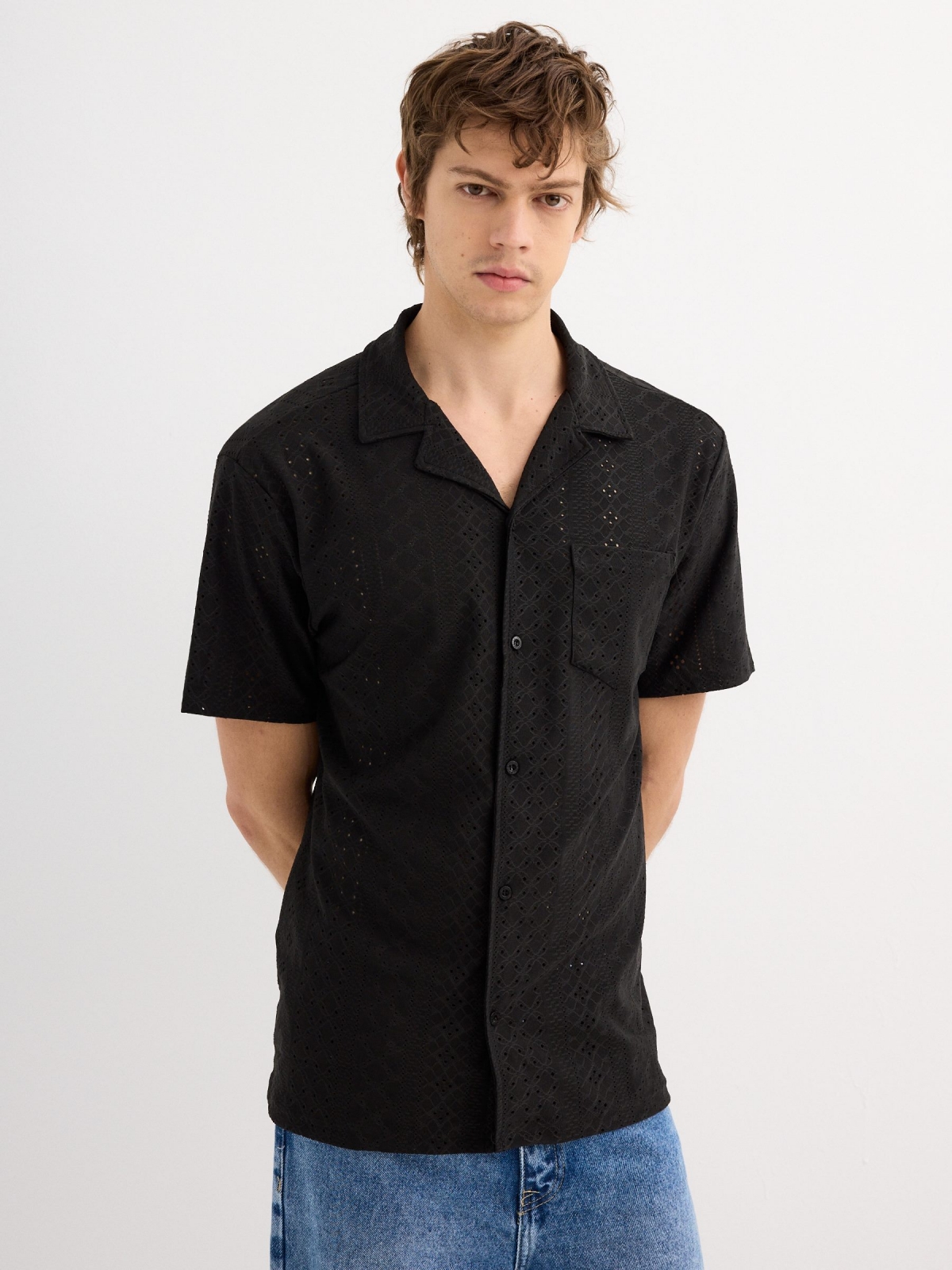 Short sleeve knit shirt black middle front view