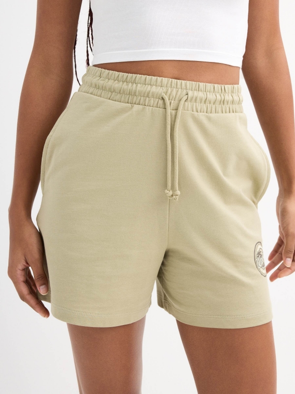 Waves fleece shorts greyish green front detail view