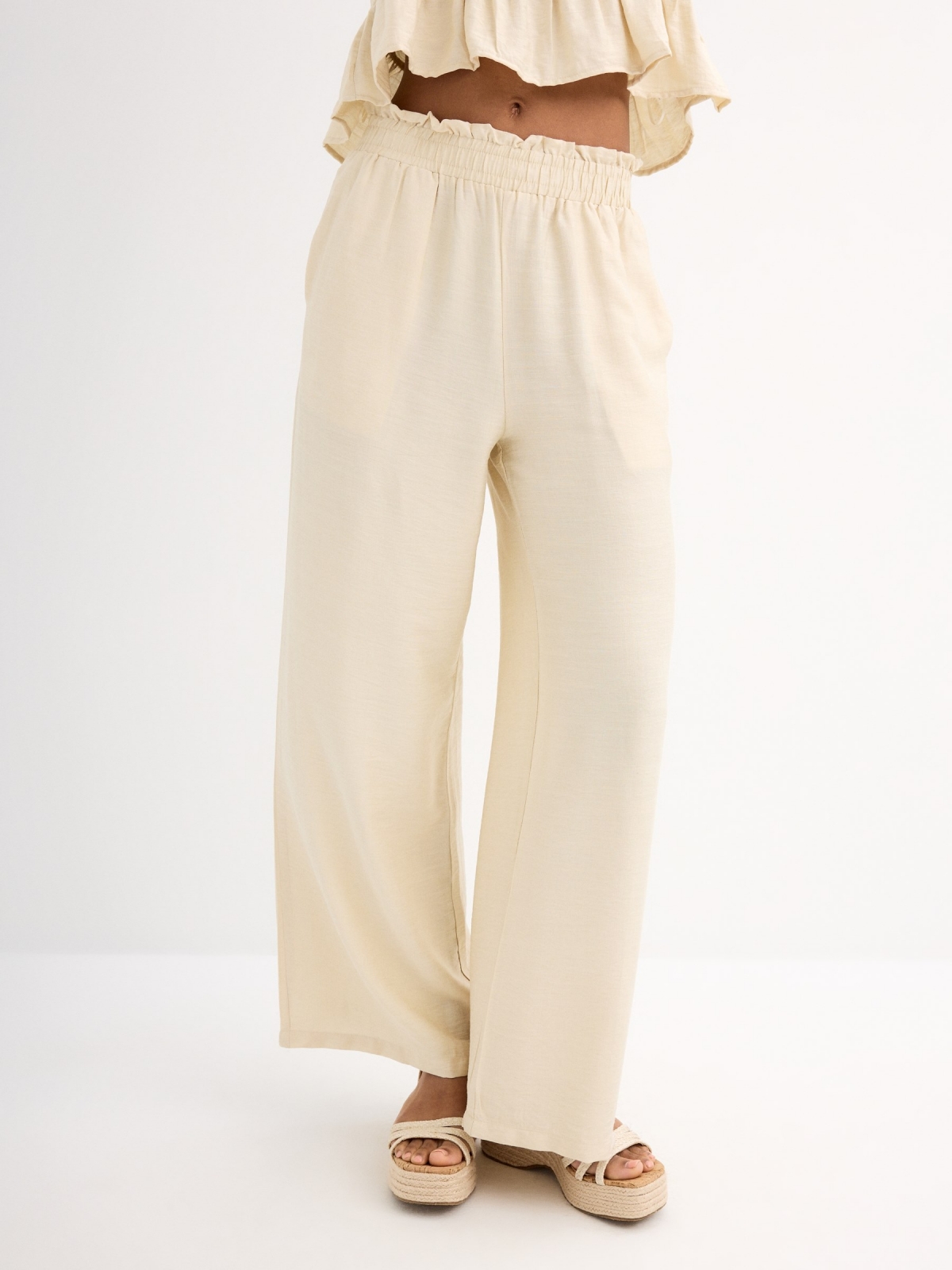 Fluid sand pants sand middle front view