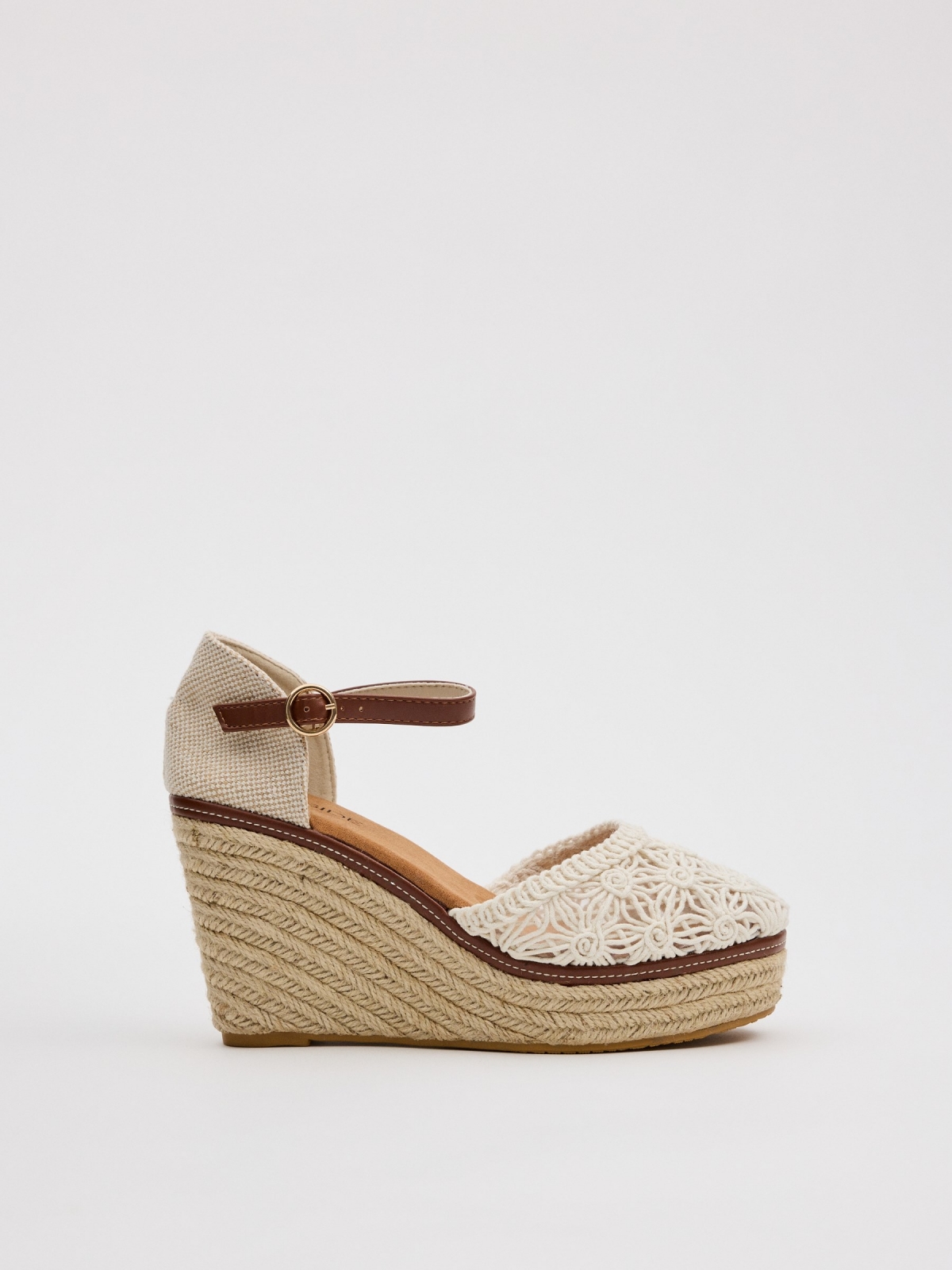 Closed-toe perforated wedges white profile view