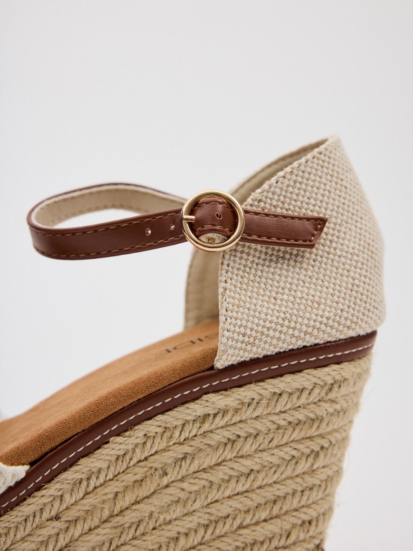 Closed-toe perforated wedges white detail view