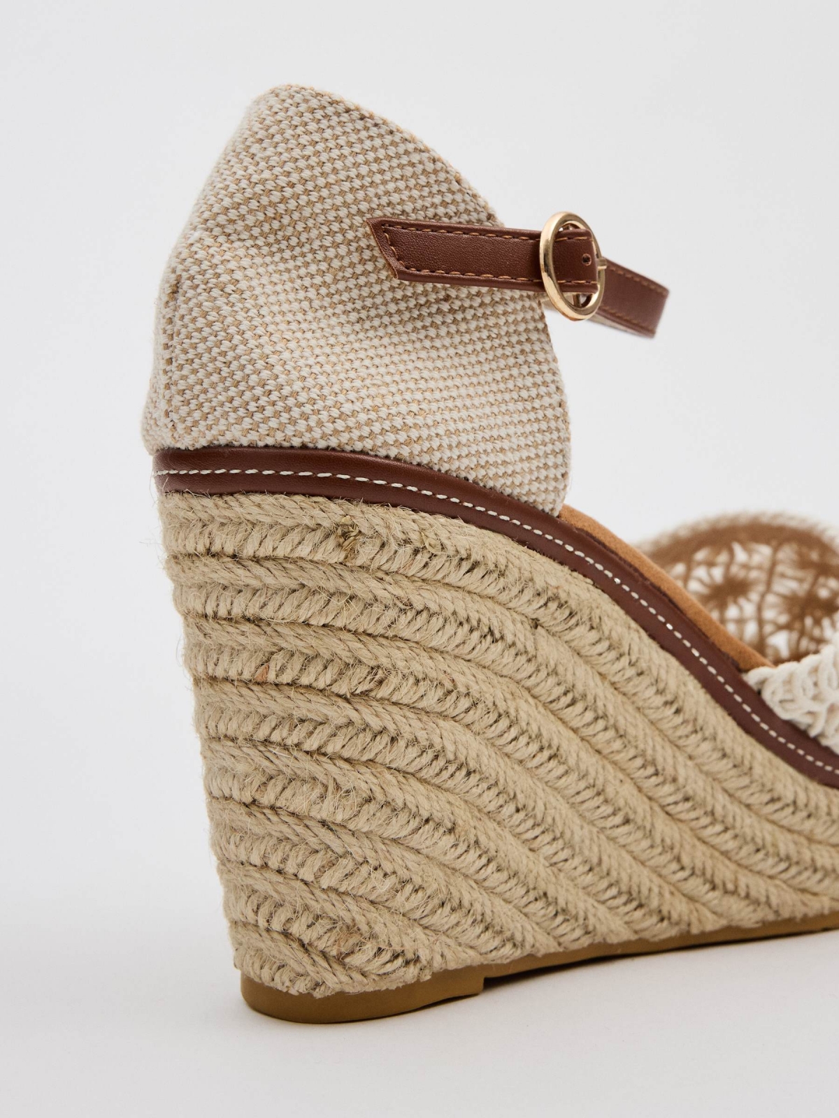 Closed-toe perforated wedges white detail view