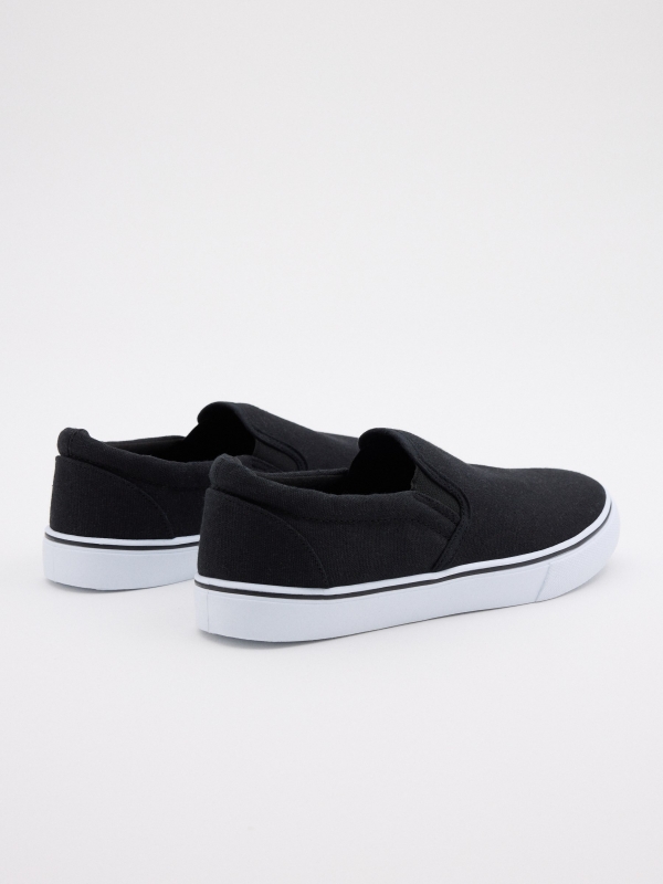 Black canvas slip-on sneaker black 45º back view