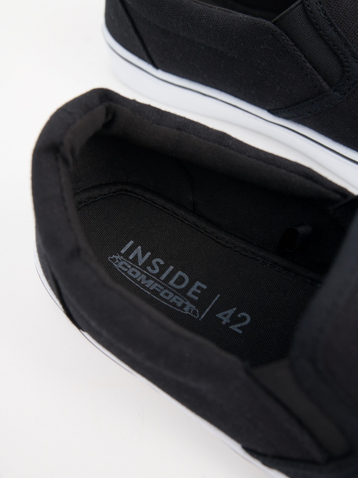 Black canvas slip-on sneaker black detail view