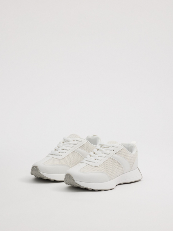 White casual running sneakers white 45º front view