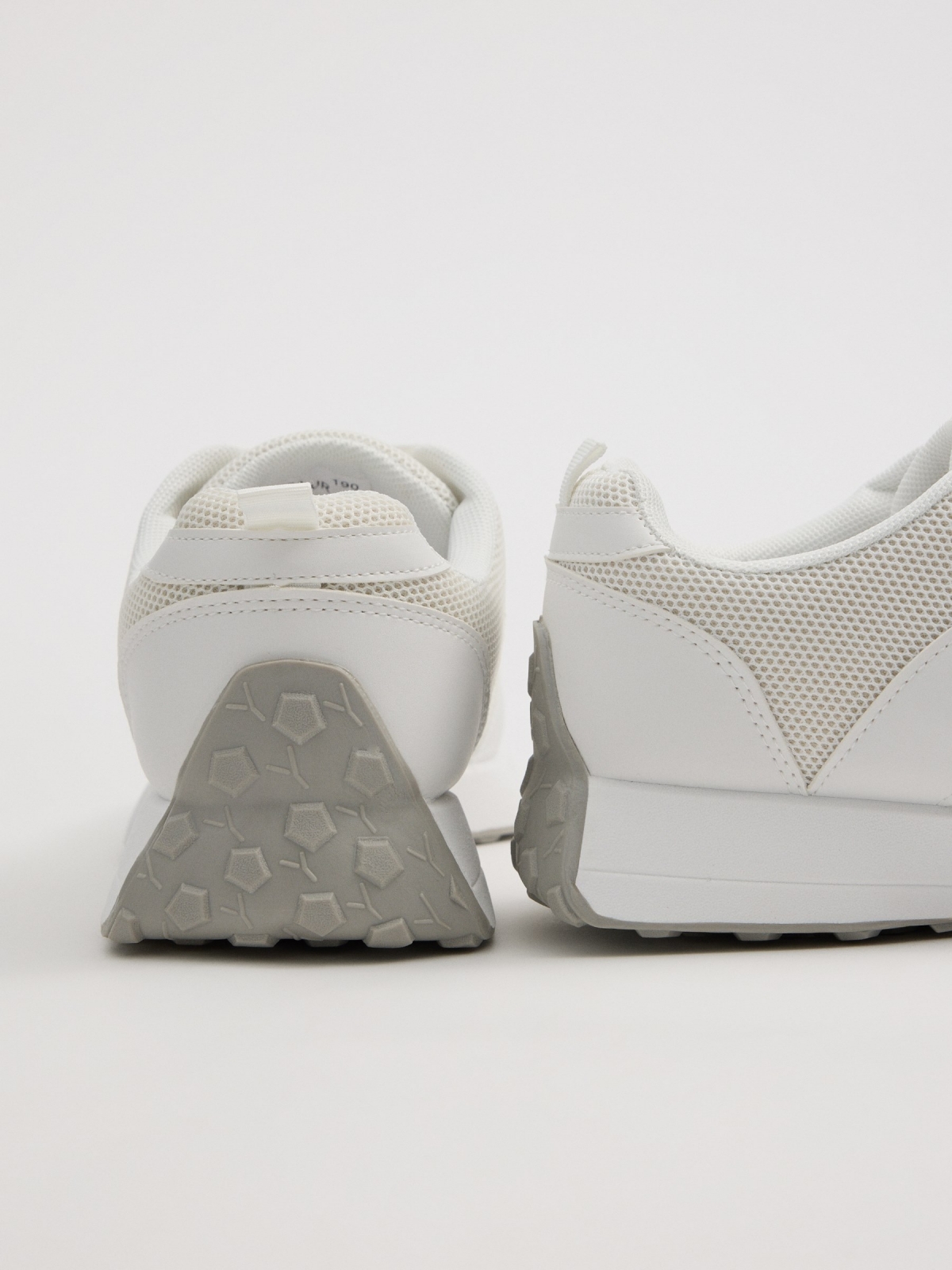 White casual running sneakers white detail view