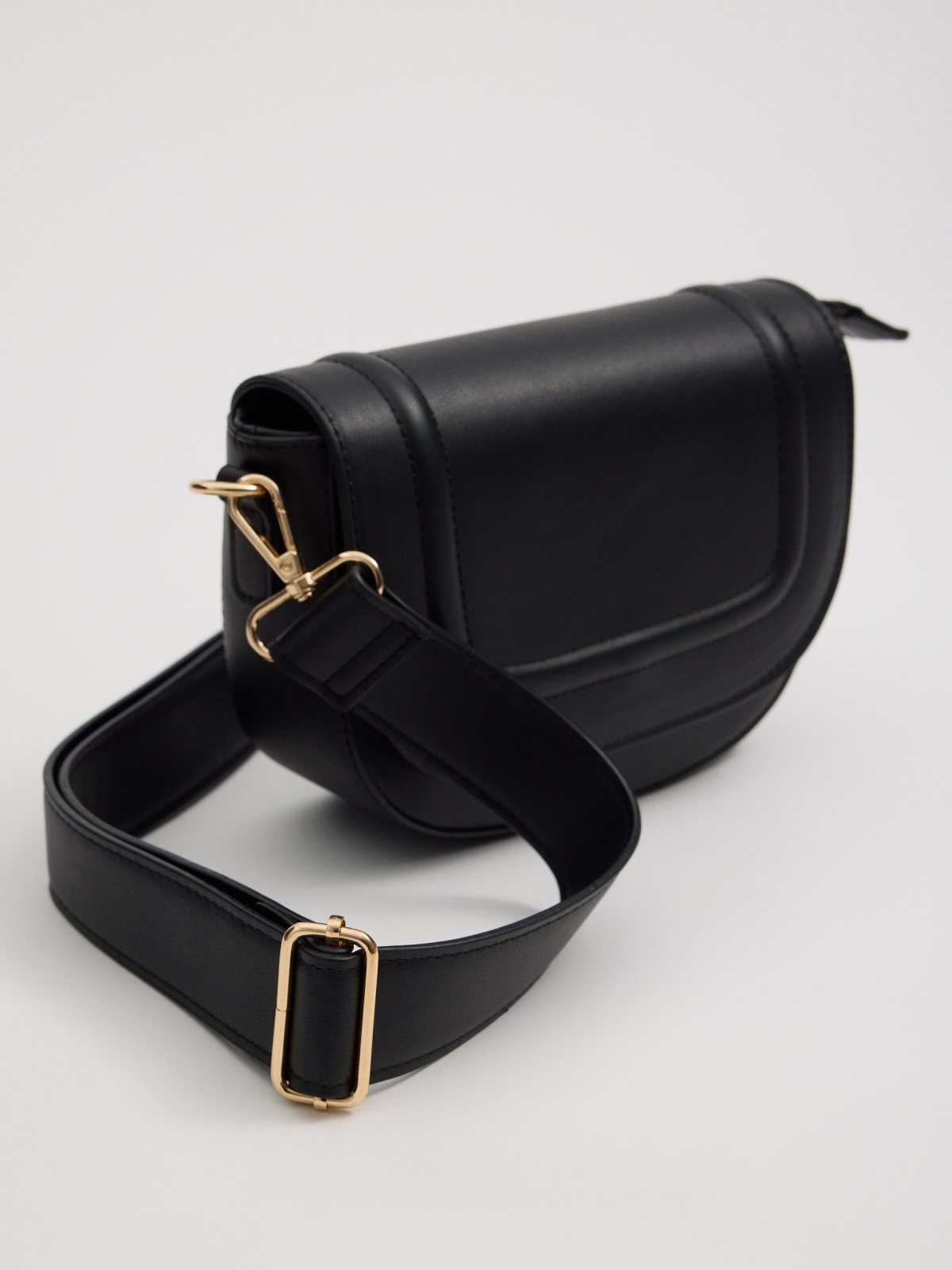 Black crossbody flap bag black interior view