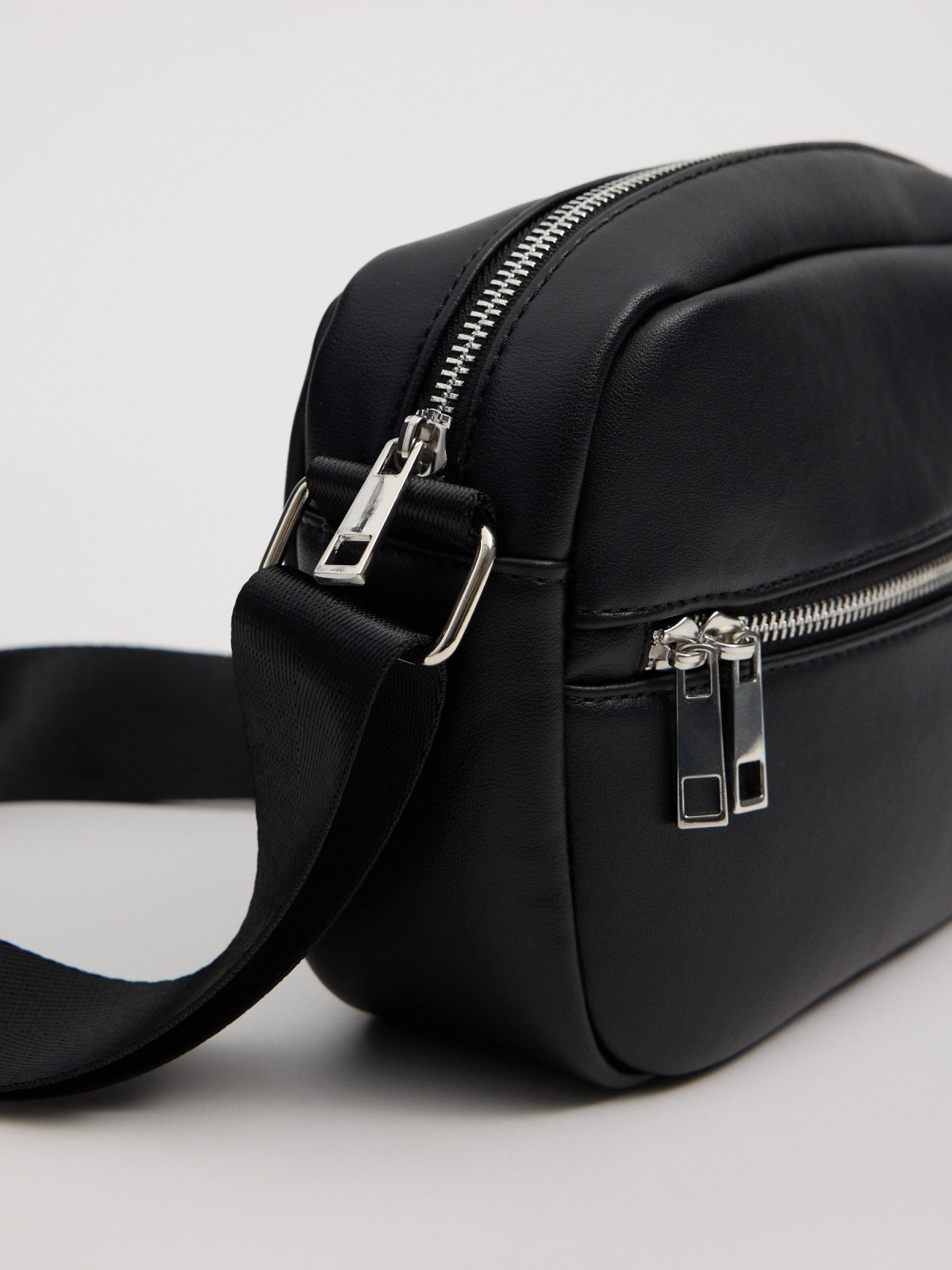 Black faux leather crossbody bag black general back view