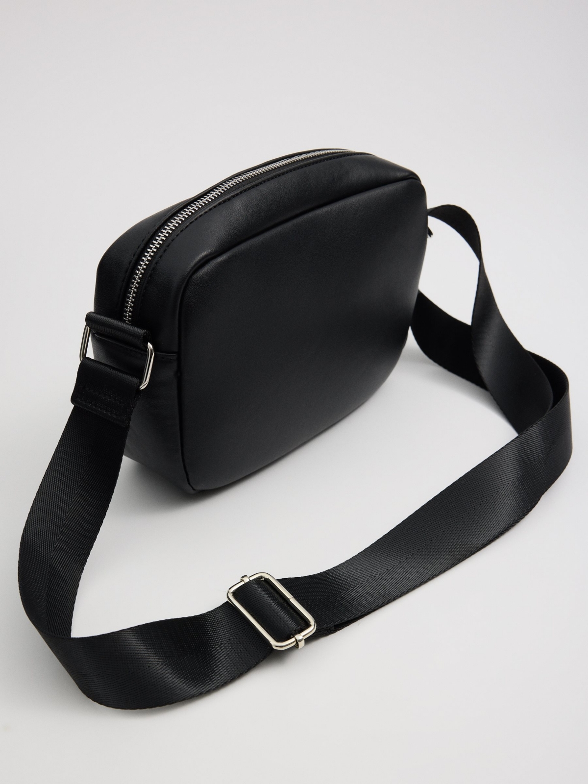 Black faux leather crossbody bag black 45º side view