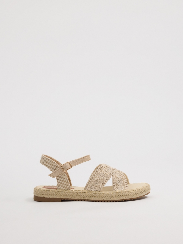 Jute sandals with crossed straps sand profile view