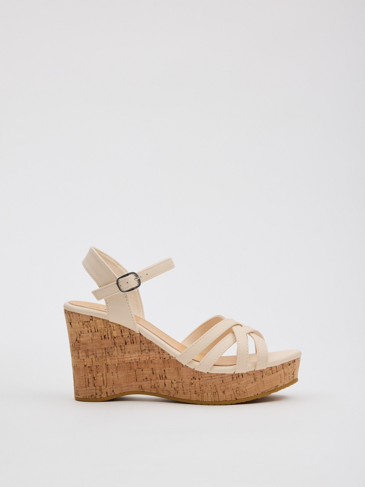 Wedge sandals with crossed straps raw profile view