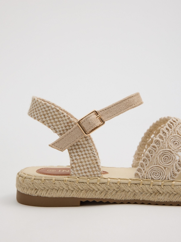 Jute sandals with crossed straps sand detail view