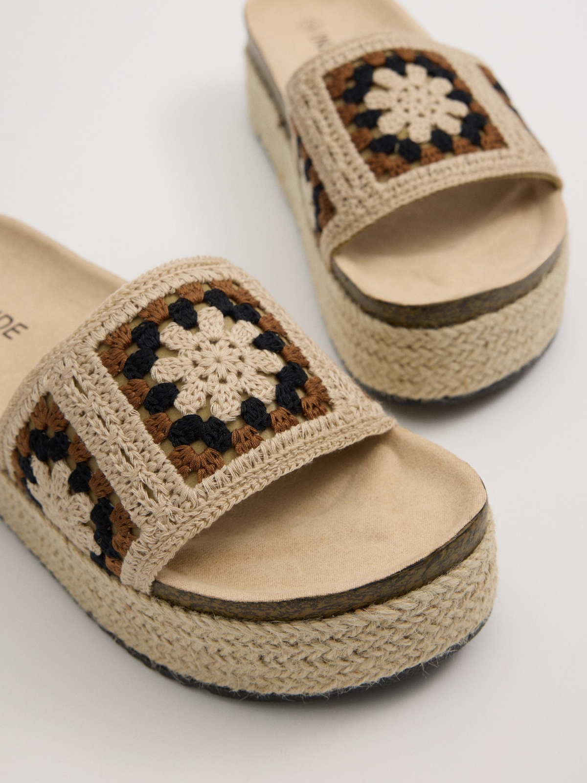 Crochet flower platform sandals sand detail view