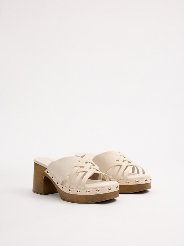 Cross-strap heeled sandals off white 45º front view