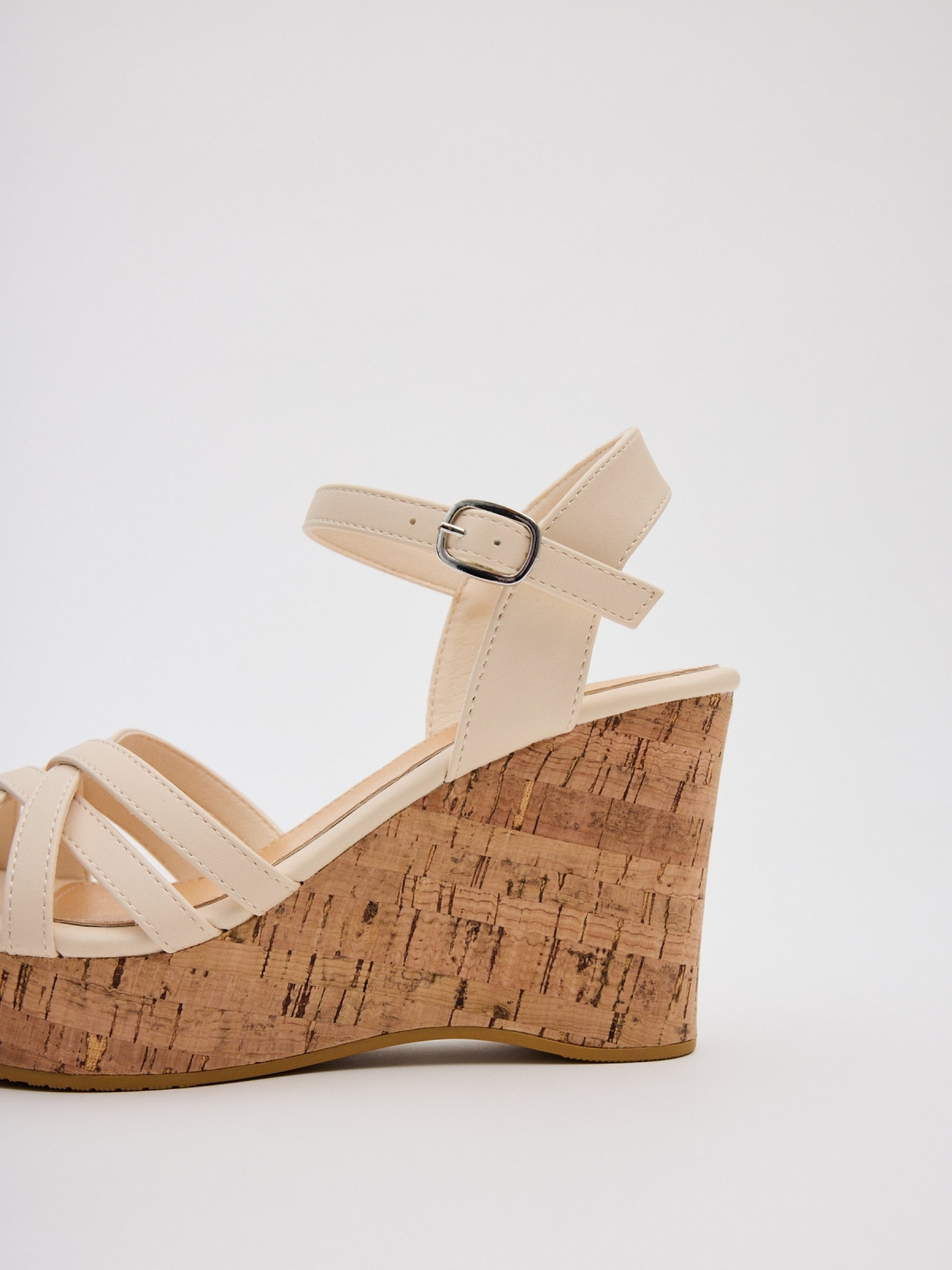 Wedge sandals with crossed straps raw detail view