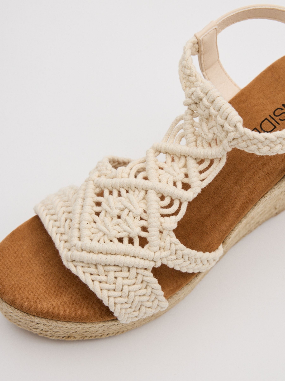 High wedge macramé sand detail view